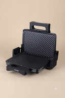 A black Keon Electric Press Grill 2000W Non-Stick 33.5x23.5cm Plate Adjustable Thermostat REEMA Art
