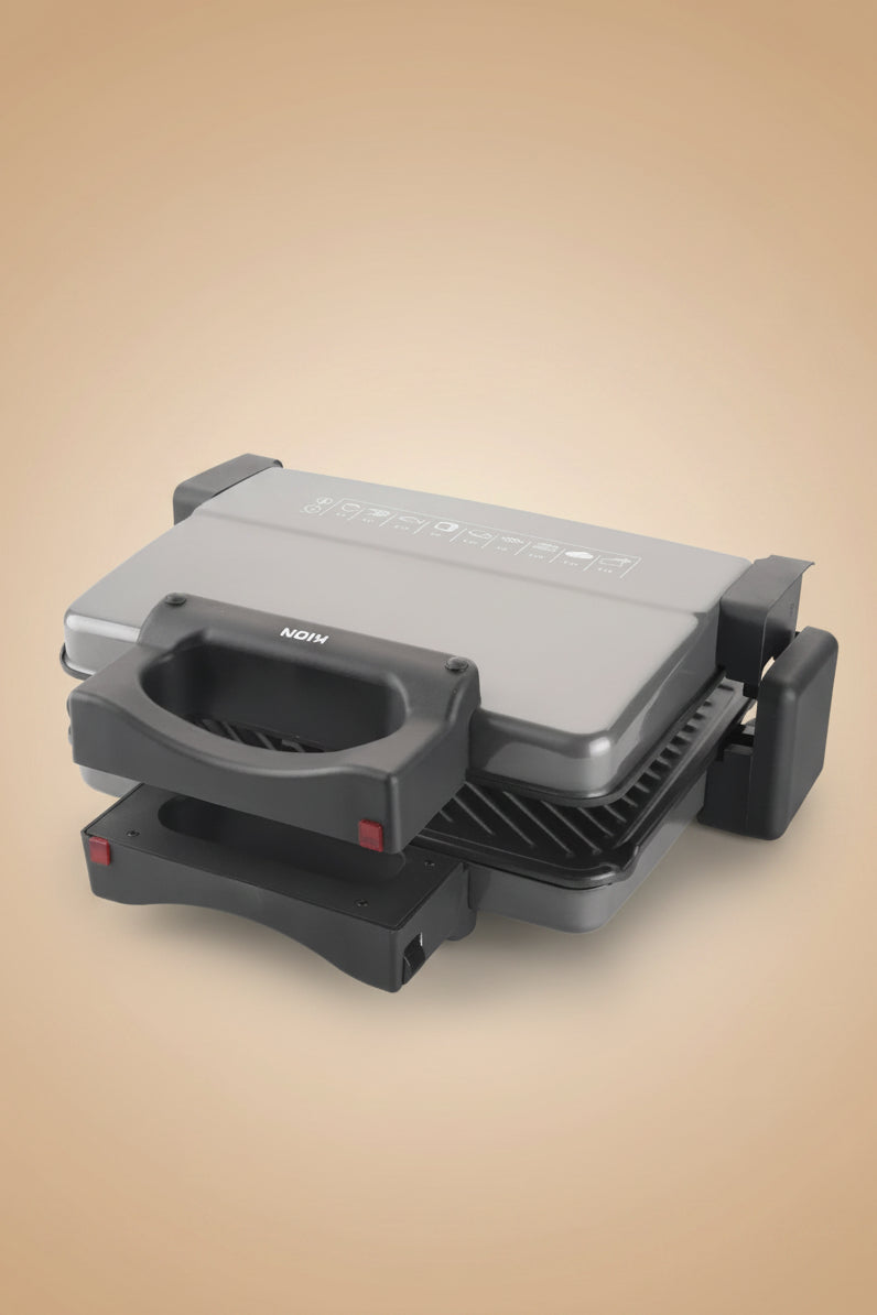A black Keon Electric Press Grill 2000W Non-Stick 33.5x23.5cm Plate Adjustable Thermostat REEMA Art
